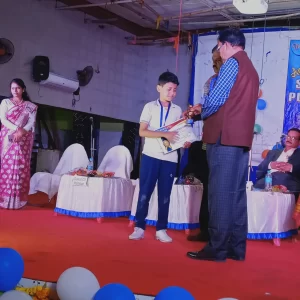 Honorable Principal Giving Prize To Little Champion
