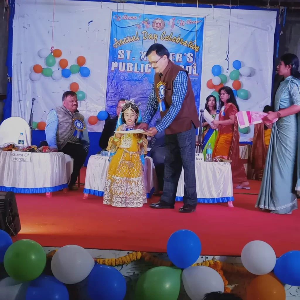 Honorable Principal Giving Prize To Little Champion