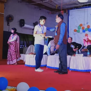 Honorable Principal Giving Prize To Little Champion