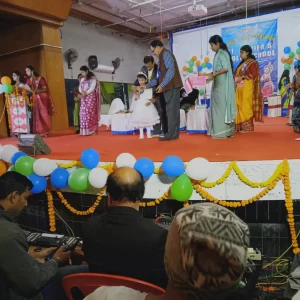 Honorable Principal Giving Prize To Little Champion