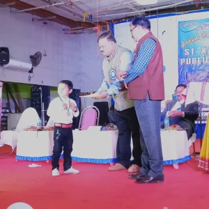 Honorable Principal Giving Prize To Little Champion