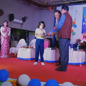 Honorable Principal Giving Prize To Little Champion