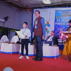 Honorable Principal Giving Prize To Little Champion