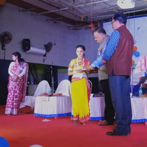 Honorable Principal Giving Prize To Little Champion